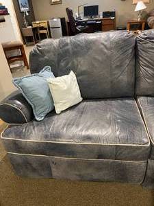 lot 33 image: Blue Reclining Couch & Throw Pillows