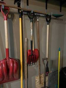 lot 165 image: Wall of Yard Tools