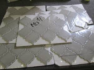 lot 150 image: 7 sheets of dove gray arabesque til...