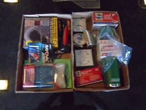 Quantity of two flats of misc householdincludes new thermos. As shown.