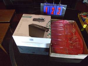 New paper shredder & flat of glassware. As shown.