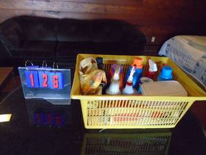 Basket of laundryhouse hold chemicals. As shown.