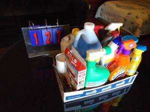 Basket of laundryhouse hold chemicals. As shown.
