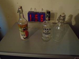 Qty of 3 empty bottles. Crazy horseice water. As shown.