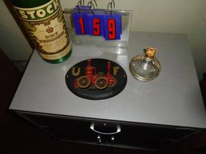 Vermouth bank & cast plaque & bottle. As shown.
