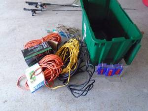 Tote full of extension cords. Couple look new. As shown.