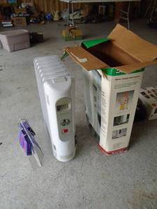 New Duracraft oil filled radiant heater. As shown.