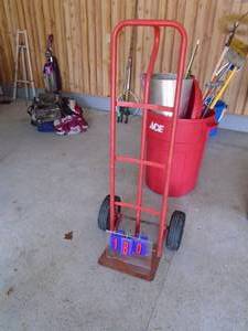 Red 2 wheel dolly. AS shown.