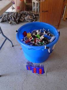 Tote of Mcdonalds happy meal figures & misc toys. As shown.