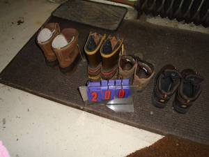 Qty of 4 pair of boots. Size 1011. As shown.