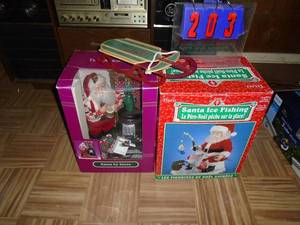 Qty of 2 Christmas figures & sled. As shown.