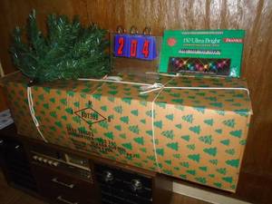 Christmas tree in box & lights. As shown.