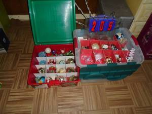 Containers of Christmas tree ornaments. As shown.