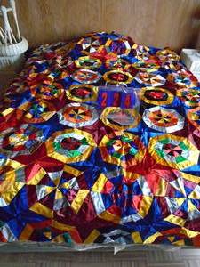 Sateen patchwork quilt. Needs to be finished. Approx queen size. As shown.
