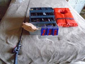 Tackle box with life jackets & Shimano rod & reel. As shown.