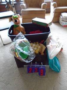 Tub of Christmas items. As shown.