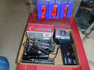 Flat of camera items. As shown.