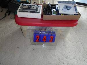 Vintage polaroid camera & sony cybershot camera. As shown.