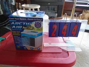 New Artic Air portable cooler. As shown.