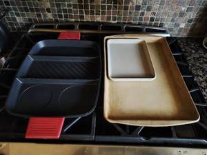 Collection of Cookware Including All Clad, Two Pampered Chef, & 10 Cast Iron Skillet