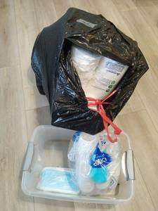 Collection of Household Items Including Paper Goods