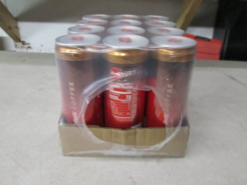 lot 254 image: case of 12 coke cola with coffee ca...