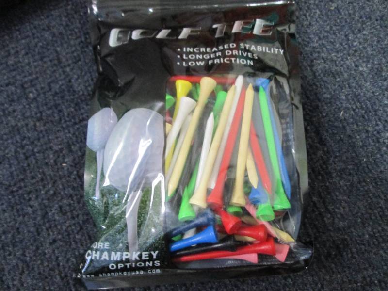 lot 131 image: 5 pks Colored Golf Tees...