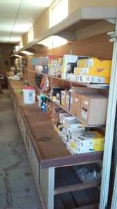 lot 43 image: 52 ft. Workbench, Storage Cupboard, Peg Board. (Removal appointment needed)