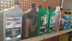 lot 28 image: Misc. Auto Fluids. De-icer, Oil, Carb. Cleaner (8)
