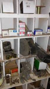 lot 225 image: Contents of Cubbies, Hose Clamps, Thermostats and more