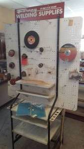 lot 101 image: Forney Welding Display with lots of contents, 4 ft. x 88 in.
