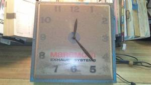 lot 191 image: Maremont Exhaust Electric Clock, powers on.
