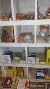 lot 214 image: Contents of Cubbies, Lights, U Joints and more