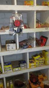 lot 216 image: Contents of Cubbies, Light Lenses, U Joints, Heater Core and more