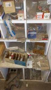 lot 222 image: Contents of Cubbies, Actuator, Stud Nuts, Manifold