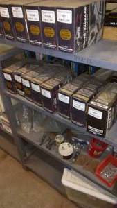 lot 284 image: (2) Shelves Ignition Wire Sets, Auto Parts & More