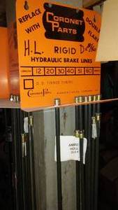 lot 325 image: Assorted Hydraulic Brake Lines & display racks.