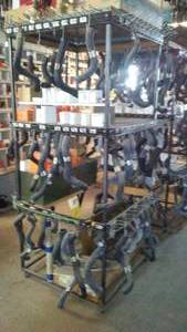 lot 346 image: 3 Tier Rolling Hose Display with Contents. 42 in. W x 91 in. T
