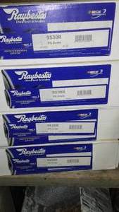lot 431 image: Shelves of Brake Drums, Manuals, More