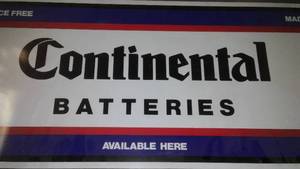 lot 474 image: Continental Batteries Sign 30 x 12 in. Loc Bin101