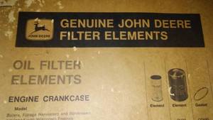 lot 552 image: John Deere Vintage Poster with Contents of Wall. Loc BO