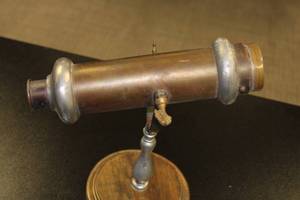 lot 45 image: Vintage Metal w Wood Base Kaleidoscope