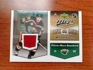 Dual Jersey Relic Hockey Card - Pierre-Marc Bouchard & Ryan Kesler