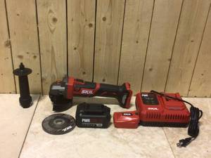 Skil PWRCore Brushless 20V Cordless 4-12 in. Angle Grinder Kit w 5.0Ah Lithium-ion Battery, PWRAsst USB Adapter and Charger&nbsp&nbspCustomer Returns&nbsp See Pictures