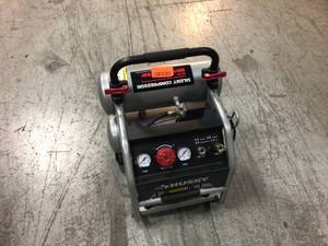 4.5 Gal. Portable Electric-Powered Silent Air Compressor by Husky Customer Returns See Pictures