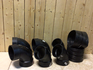 lot 82 image: Charlotte Pipe 4 in. ABS DWV 90-Degree Hub x Hub Elbow Fitting Customer Returns See Pictures