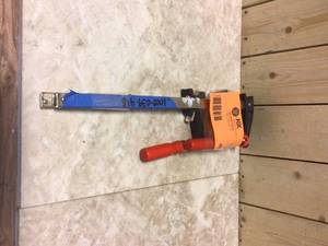 lot 88 image: BESSEY Clutch Style 12 in. Capacity Bar Clamp with Wood Handle and 2-12 in. Throat Depth Customer Returns See Pictures