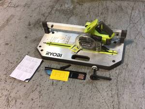 lot 11 image: RYOBI ONE 18V 5-12 in. Flooring Saw with Blade (Tool Only)   USED Customer Returns See Pictures