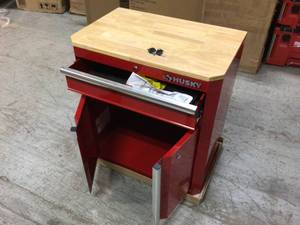 lot 111 image: Ready-to-Assemble 24-Gauge Steel 1-Drawer 2-Door Garage Base Cabinet in Red (28 in. W x 33 in. H x 18 in. D) by Husky Customer Returns See Pictures