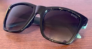 lot 55 image: Gucci Sunglasses